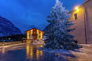 Cozy Prints: View of Christmas tree and decorations in Piazza Abbe Henry at dusk