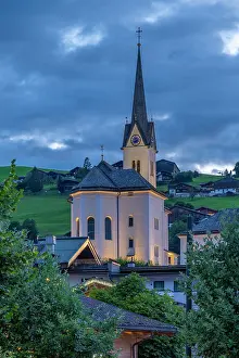 Experiences Prints: View of church at dusk in Kaprun with summer colors and mountain scenery in background