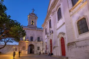 Alfama Prints: View of Church of Our Lady of Grace at dusk in the Alfama District