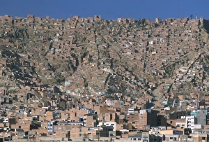 Suburb Prints: View across city from El Alto, of suburb houses stacked up hillside, La Paz, Bolivia
