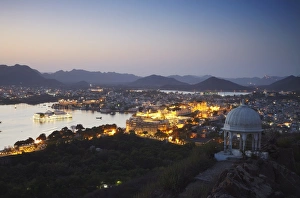 Udaipur Prints: View of City Palace and Lake Palace Hotel at sunset, Udaipur, Rajasthan, India, Asia