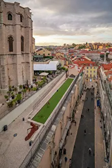 Clarity Prints: View of city rooftops and Carmo Archaeological Museum from Santa Justa Lift during golden hour