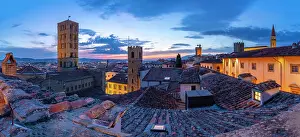 Arezzo Prints: View of city skyline and rooftops from Palazzo della Fraternita dei Laici at dusk