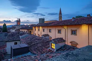 View of city skyline and rooftops from Palazzo della Fraternita dei Laici at dusk, Arezzo, Province of Arezzo, Tuscany, Italy, Europe
