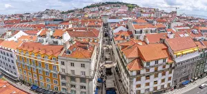 Lively Prints: View of city skyline from Santa Justa Lift on a sunny day, Lisbon, Portugal, Europe