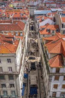 Pedestrians Prints: View of city skyline from Santa Justa Lift on a sunny day, Lisbon, Portugal, Europe
