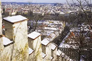 Mala Strana Prints: View of city from snow covered Gothic Hunger Wall on Petrin Hill, Mala Strana