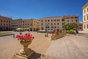Sassari Prints: View of classic architecture and Vittorio Emanuele II statue in Piazza d'Italia in Sassari