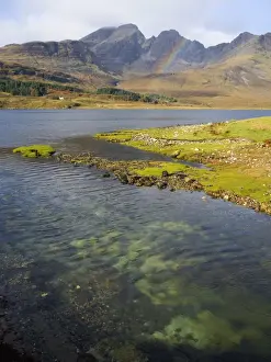 Vast Prints: View across the clear waters of Loch Slapin to rainbow over the Cuillin Hills