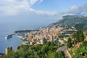 Cruise Prints: View of the coastline and cityscape of the Principality of Monaco from the Corniche with clear skies