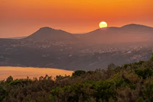 Ionian Islands Prints: View of coastline near Lourdata at sunset