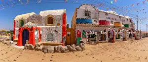Identity Prints: View of colourful architecture at Nagaa Suhayl Gharb on the Nile river near Aswan