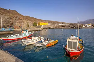 Gran Canaria Prints: View of colourful boats in harbour and mountains in background