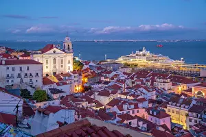 Alfama Prints: View of colourful buildings and red rooftops at dusk in the Alfama District