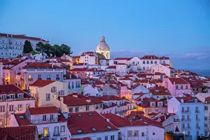 Alfama Prints: View of colourful buildings and red rooftops at dusk in the Alfama District