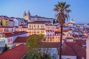 Alfama Prints: View of colourful buildings and red rooftops at dusk in the Alfama District