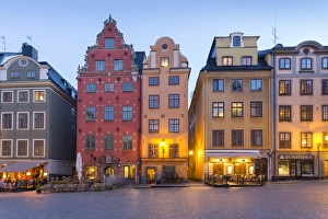 Stockholm Prints: View of colourful buildings on Stortorget, Old Town Square in Gamla Stan at dusk