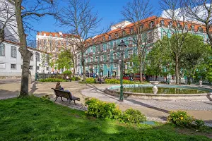 Facades Prints: View of colourful buildings on a sunny day in the Alfama District