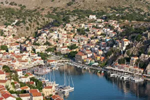 Typically Greek Gallery: View over the colourful harbour, Gialos (Yialos), Symi (Simi), Rhodes, Dodecanese Islands