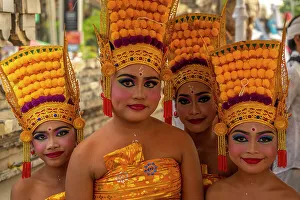 Kids Prints: View of colourfully dressed girls on Kuta Beach for Nyepi