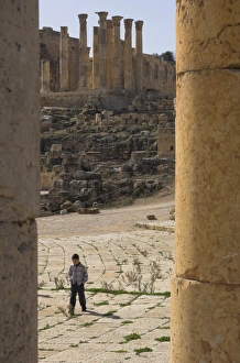 One Boy Only Prints: View through columns of boy walking past