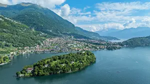 Settlement Prints: View of Comacina Island with Lake and Mountains under Blue Sky in Italy