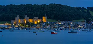Conwy Prints: View of Conwy Castle, UNESCO World Heritage Site, and Conwy River at dusk, Conwy, Gwynedd