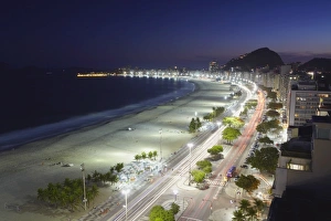 Copacabana Prints: View of Copacabana beach and Avenida Atlantica at dusk