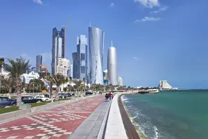 View along the Corniche towards the new skyline of the West Bay central financial district, Doha, Qatar, Middle East