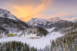 Drone Shot Prints: View by drone of sunset over Monte Piana and woods covered with snow, Misurina, Dolomites