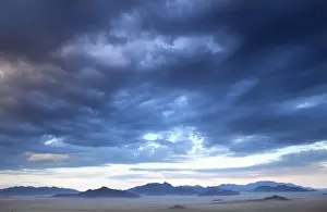 View at dusk over the magnificent landscape of the Namib Rand game reserve, Namib Naukluft Park, Namibia, Africa