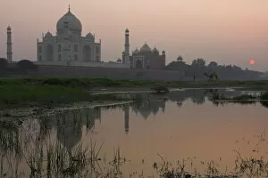 Moody Collection: View at dusk across the Yamuna river of the Taj Mahal