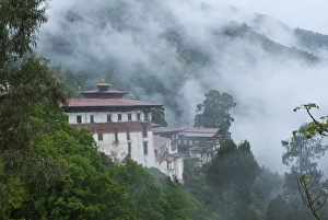 Rain Forest Prints: View of the Dzong with hills and fog, Trongsa, Bhutan, Asia