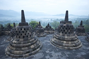 9th Century Prints: View over early morning monsoon mist lying across countryside
