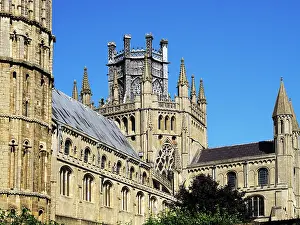 Spires Prints: View of Ely Cathedral with clear blue sky and detailed architecture in the city of Ely