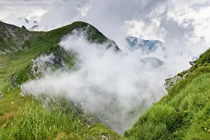 Romania Prints: View of Fagaras mountains with Balea lake in Romania showing clouds and grass