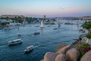 Nubia Prints: View of fellucas on the Nile river from Feryal Garden at dusk