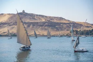 Nubia Prints: View of fellucas on the Nile river on a sunny day