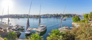 Nubia Prints: View of fellucas on the Nile river on a sunny day