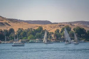 Nubia Prints: View of fellucas on the Nile river on a sunny day