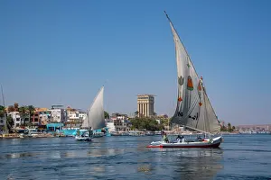 Nubia Prints: View of feluccas on the Nile river from small boat in Aswan