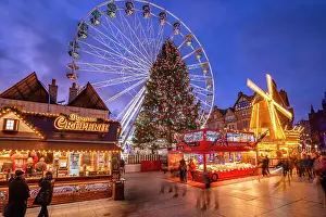 Ferris Wheel Prints: View of ferris wheel and Christmas Market on Old Market Square at dusk