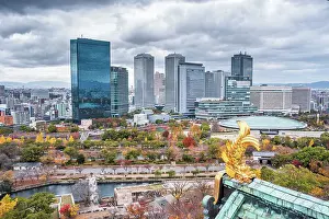 Heritage Site Prints: View from the top floor of Osaka Castle with the park and business city sector and a golden fish roof detail