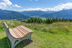 Bench Prints: View of flowers, meadows and mountains from Plettsaukopf Reservoir on a sunny day