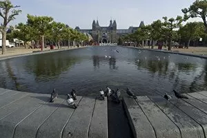 View of fountain looking towards Rijksmuseum, Amsterdam, Netherlands, Europe