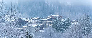 Chalets Prints: View of frosted trees and chalets in Dolonne during winter