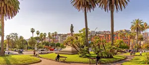 Benches Prints: View of Giovanni Nicotera statue and colourful architecture in Piazza della Vittoria