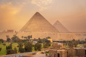 Mesmerizing Prints: View of the Giza Pyramids from rooftop terrace during golden hour