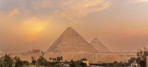 Giza Prints: View of the Giza Pyramids from rooftop terrace during golden hour
