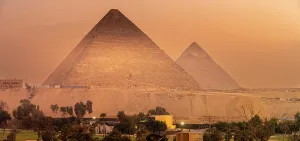 Terrace Prints: View of the Giza Pyramids from rooftop terrace during golden hour